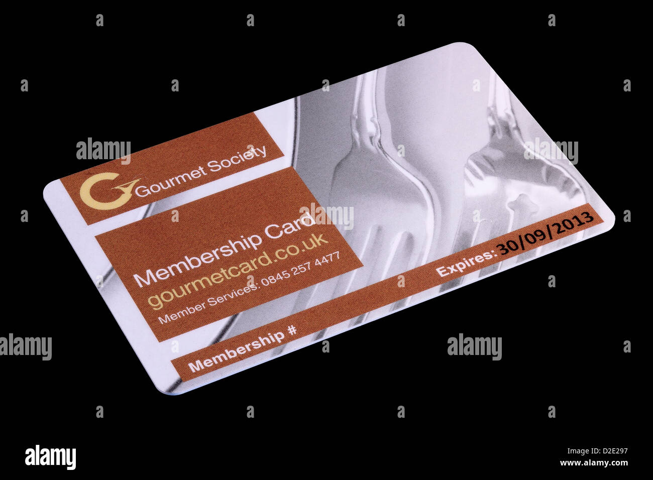 Gourmet-Gesellschaft-Mitgliedskarte mit Mitgliedsnummer entfernt auf schwarzem Hintergrund isoliert Stockfoto