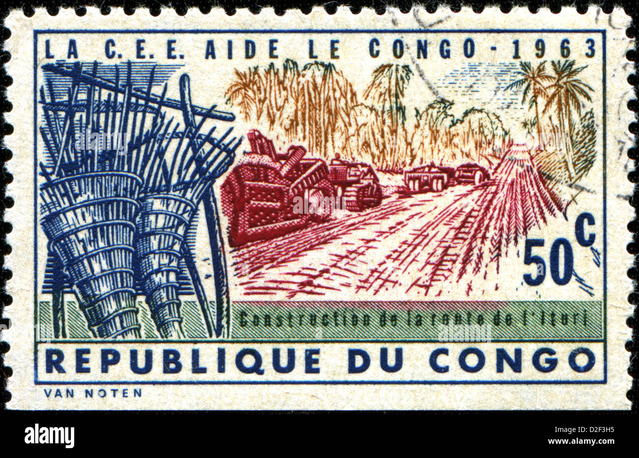 Kongo - ca. 1963: Eine Briefmarke gedruckt in Kongo (Kinshasa) zeigt der Ituri Baustraße, European Economic Community Hilfe circc Stockfoto