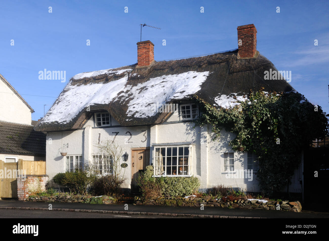 Anfang 18. c. Reetdachhaus, genannt 'LittleThatch', in Thrussington, Leicestershire, England Stockfoto
