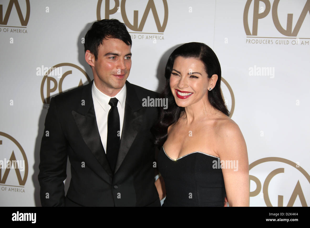 US-Schauspielerin Julianna Margulies und ihr Ehemann Keith Lieberthal kommen bei den 24. annual Hersteller Guild Awards im Hotel Beverly Hills in Beverly Hills, USA, 26. Januar 2013. Foto: Hubert Boesl/Dpa/Alamy Live News Stockfoto