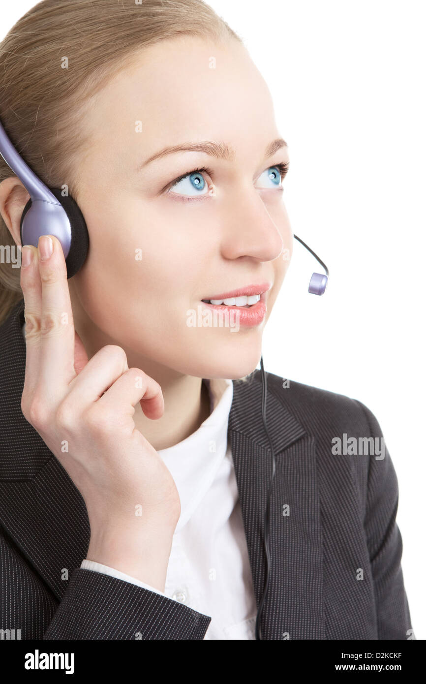 Geschäftsfrau im Gespräch mit Kunden auf Kopfhörer, isoliert auf weiss Stockfoto