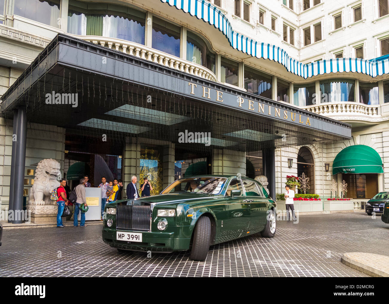Peninsula Hotel, Kowloon, Hong Kong - eine Flotte von Rolls-Royce Autos verwendet durch das hotel Stockfoto