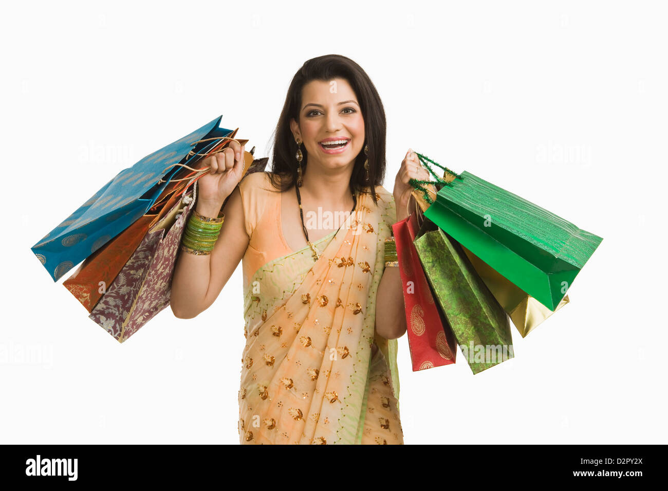 Frau Holding Shopping bags Stockfoto
