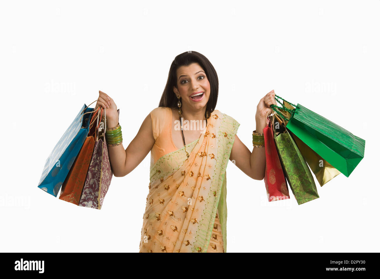 Frau Holding Shopping bags Stockfoto