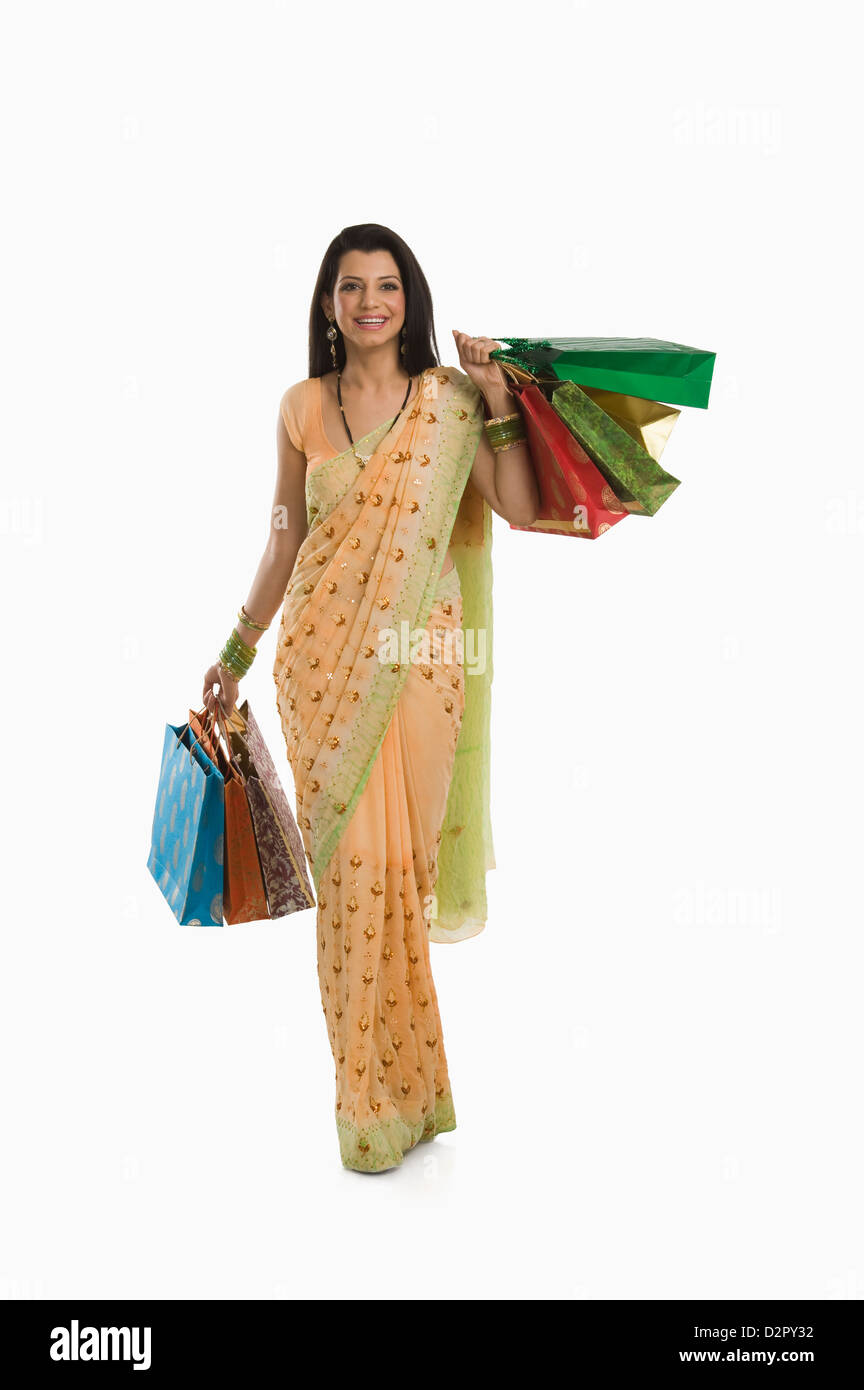 Frau Holding Shopping bags Stockfoto