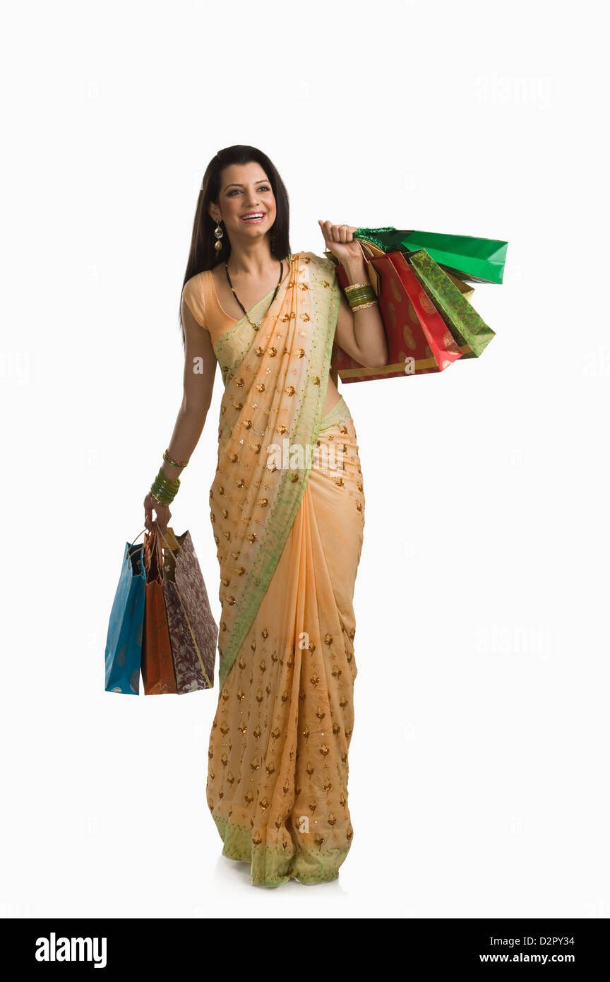 Frau Holding Shopping bags Stockfoto