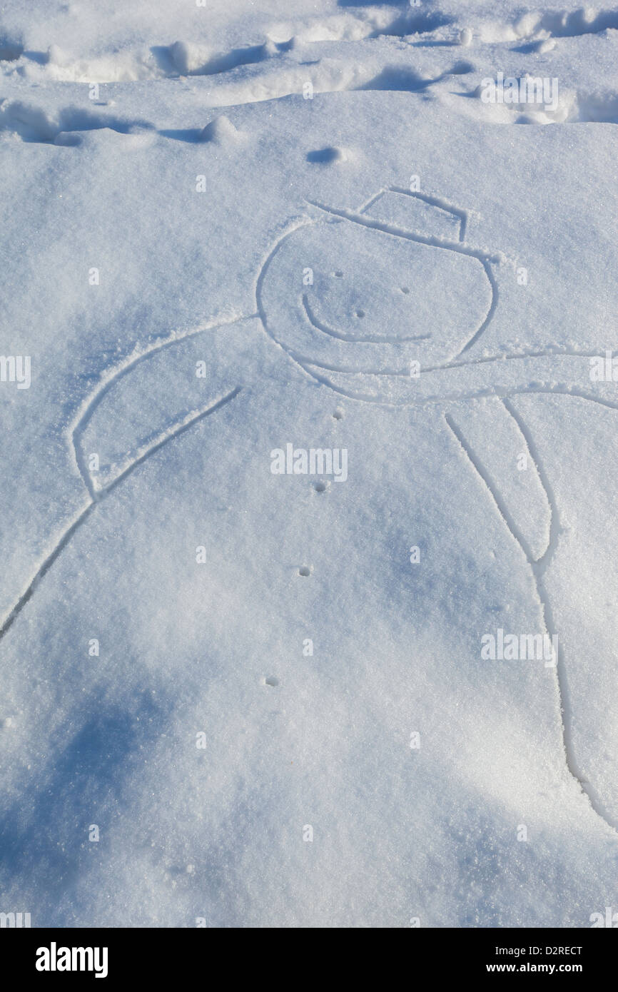 Schneemann im Schnee gezogen Stockfoto