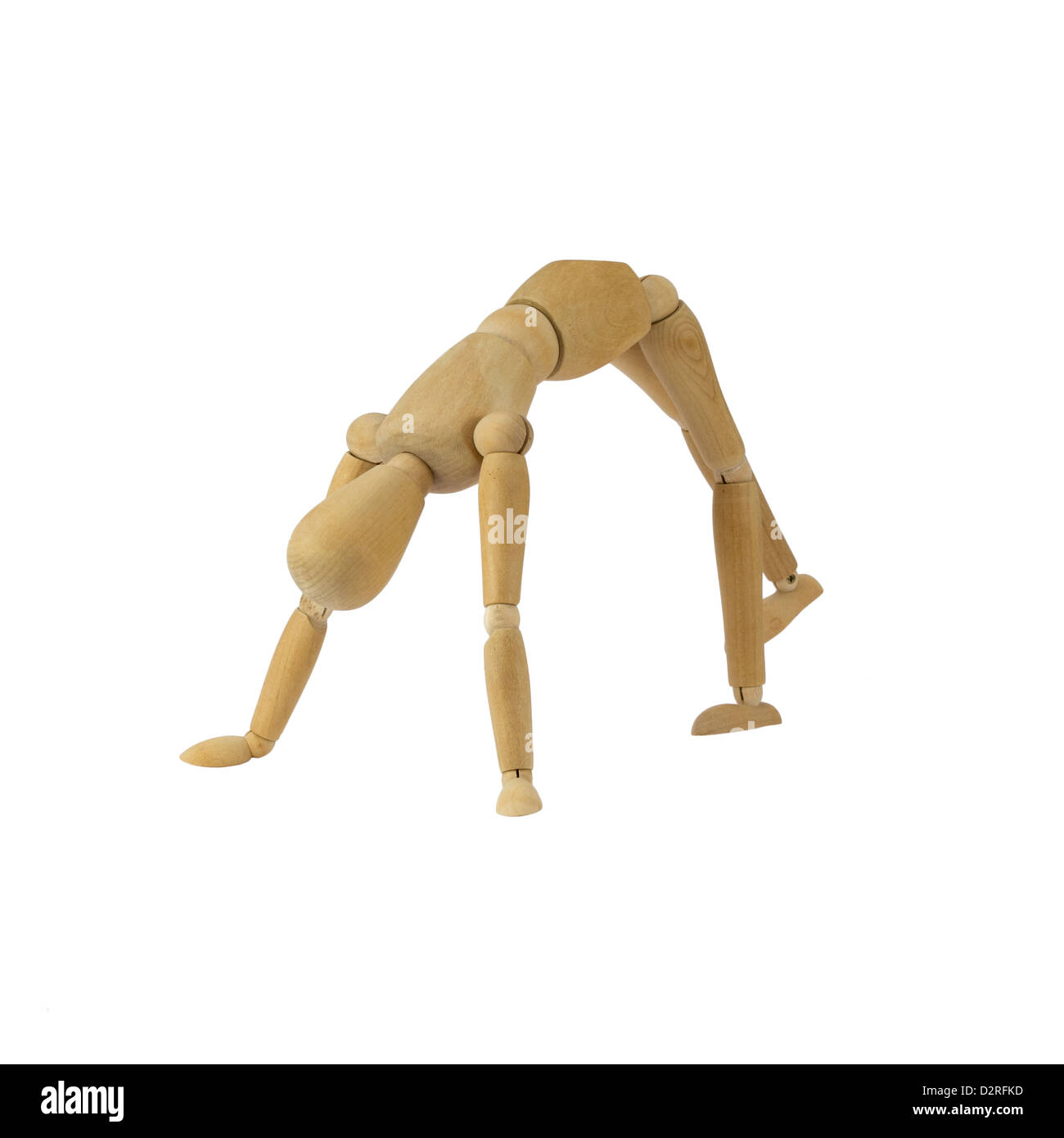 Hölzerne Frauenfigur macht handstand Stockfoto
