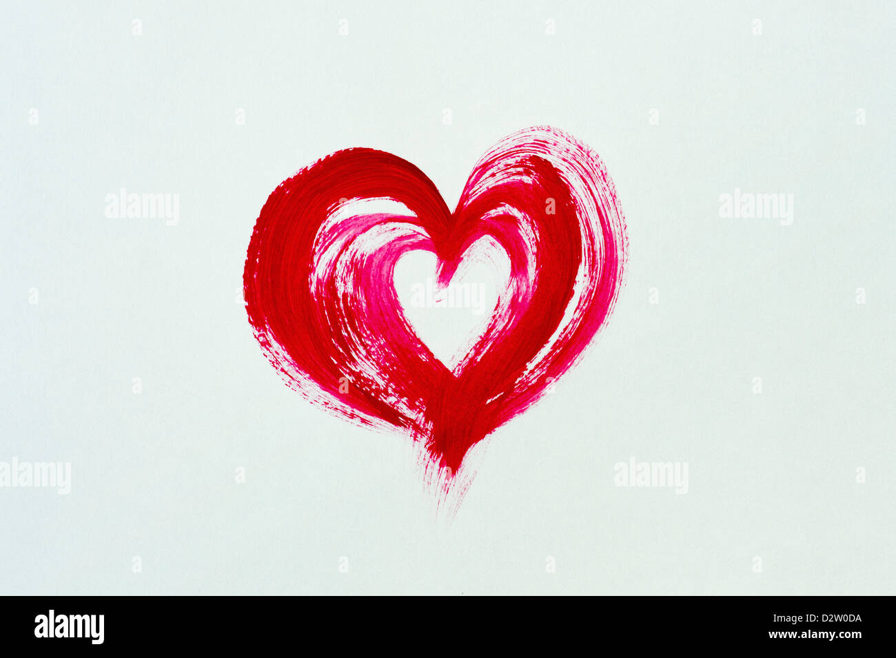 Rotes Herz auf weißem Hintergrund gemalt Stockfoto