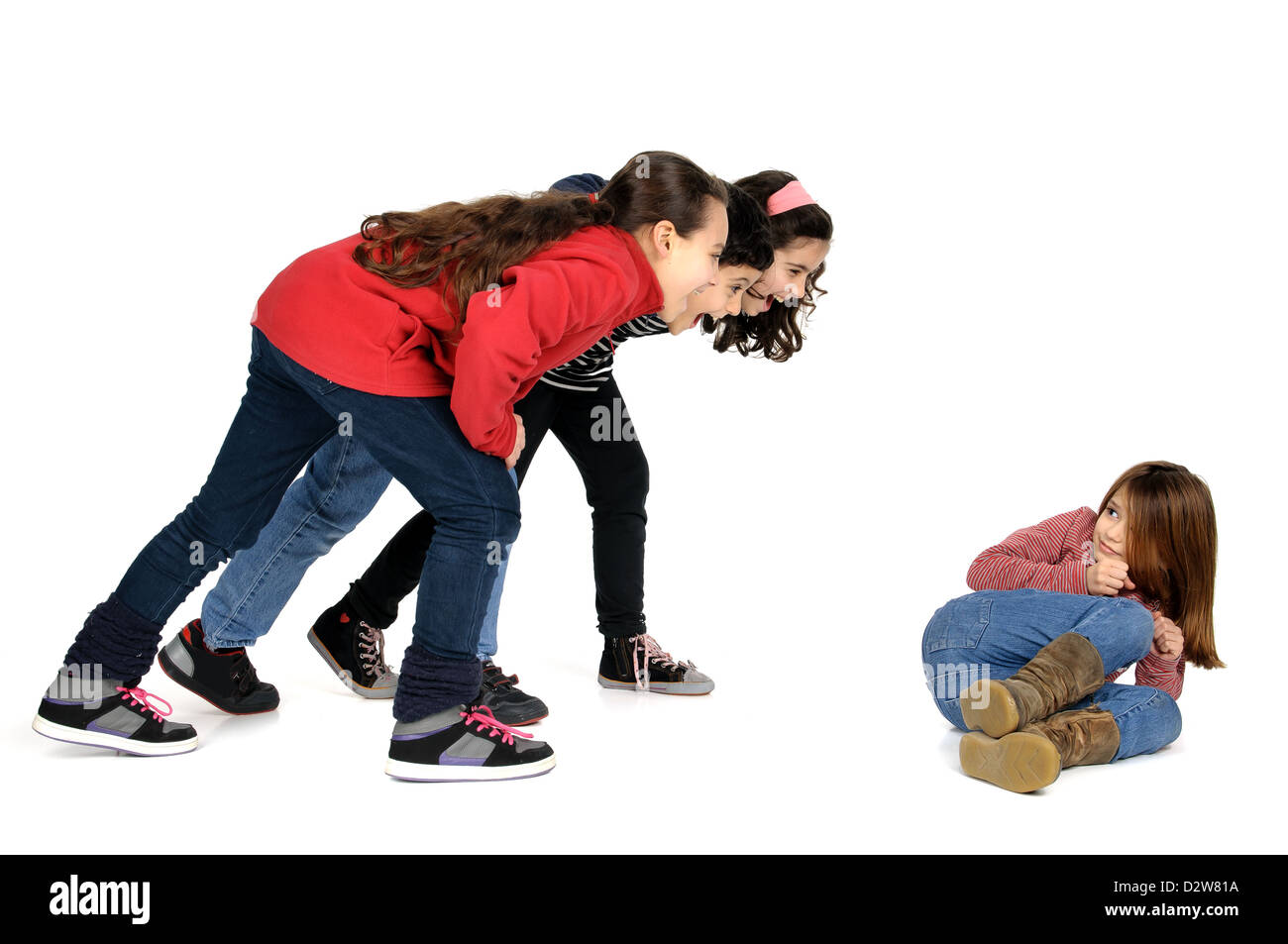 Gruppe von Kindern Mobbing ein isolierte Kind Stockfoto