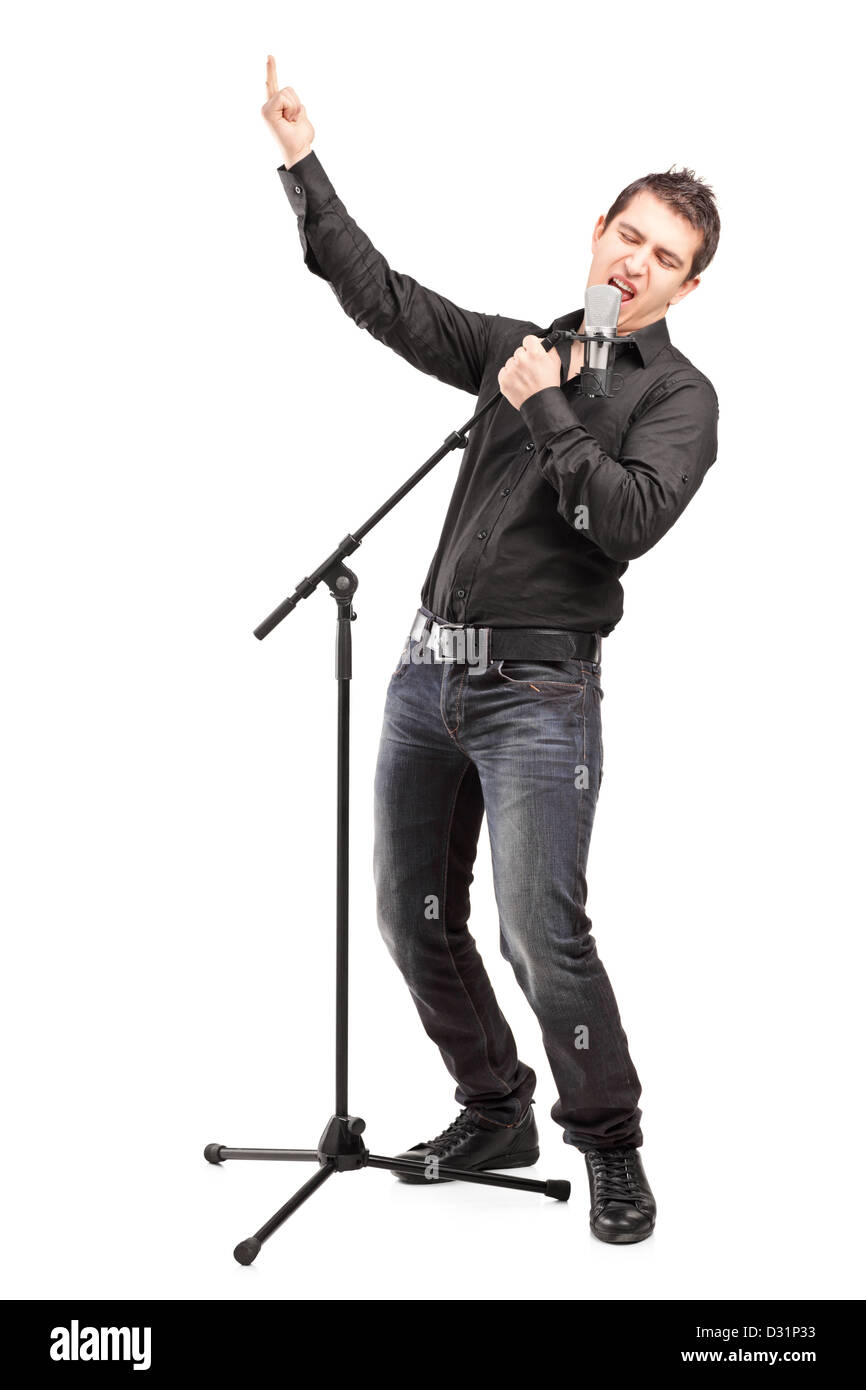 In voller Länge Portrait von einem männlichen Sänger ein Lied isoliert auf weißem Hintergrund Stockfoto