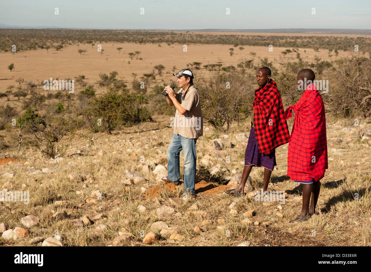 Walking-Safari mit Masai Guides, Masai Mara National Reserve, Kenia Stockfoto