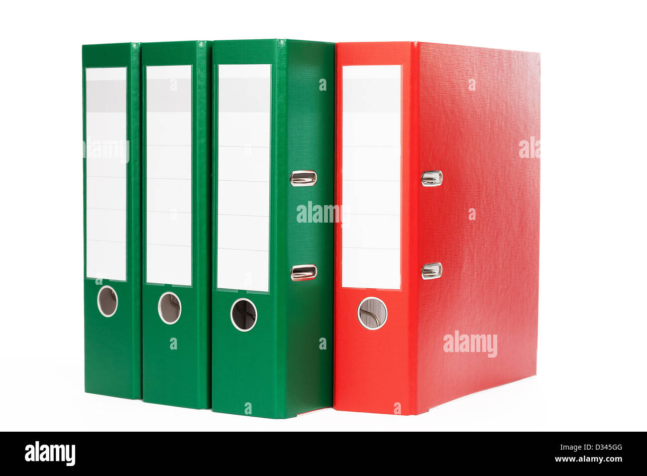 drei grüne und eine rote ring Bindemittel auf weißem Hintergrund Stockfoto