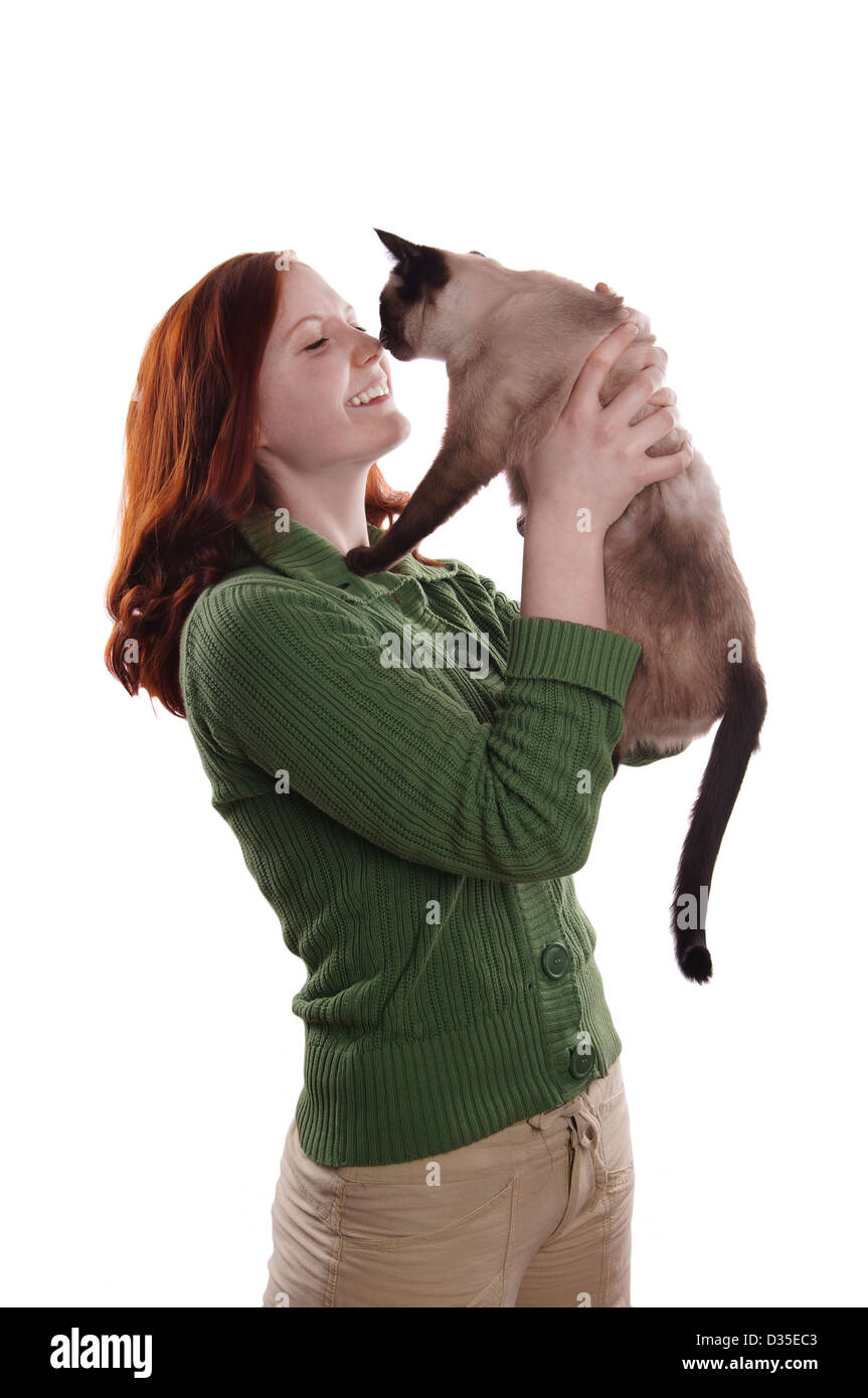 glückliche junge Frau mit Katze Stockfoto