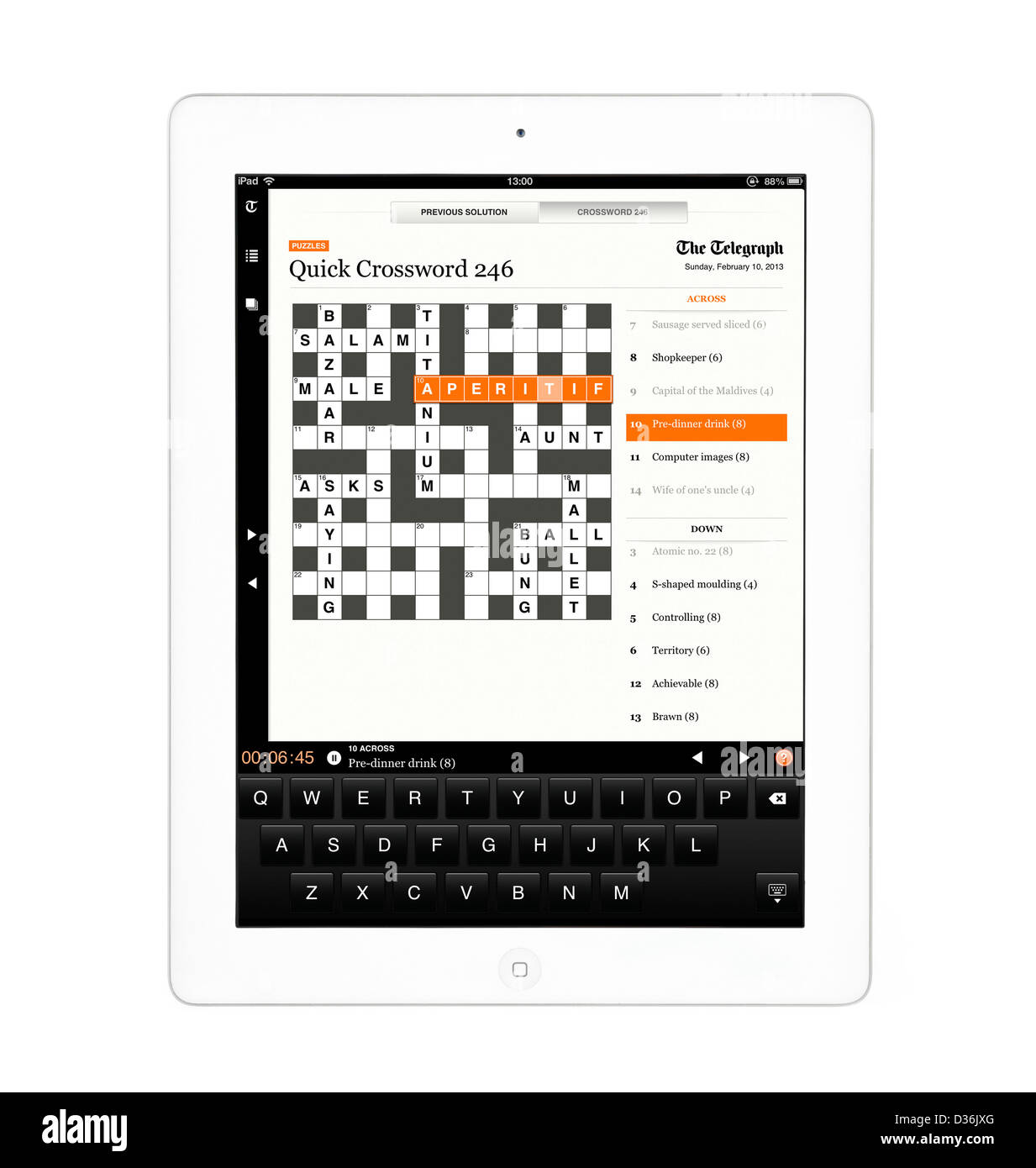 Tun Sie das Kreuzworträtsel in der Telegraph-app auf einem Apple iPad 4. Genration Retina Display Tablettcomputer Stockfoto