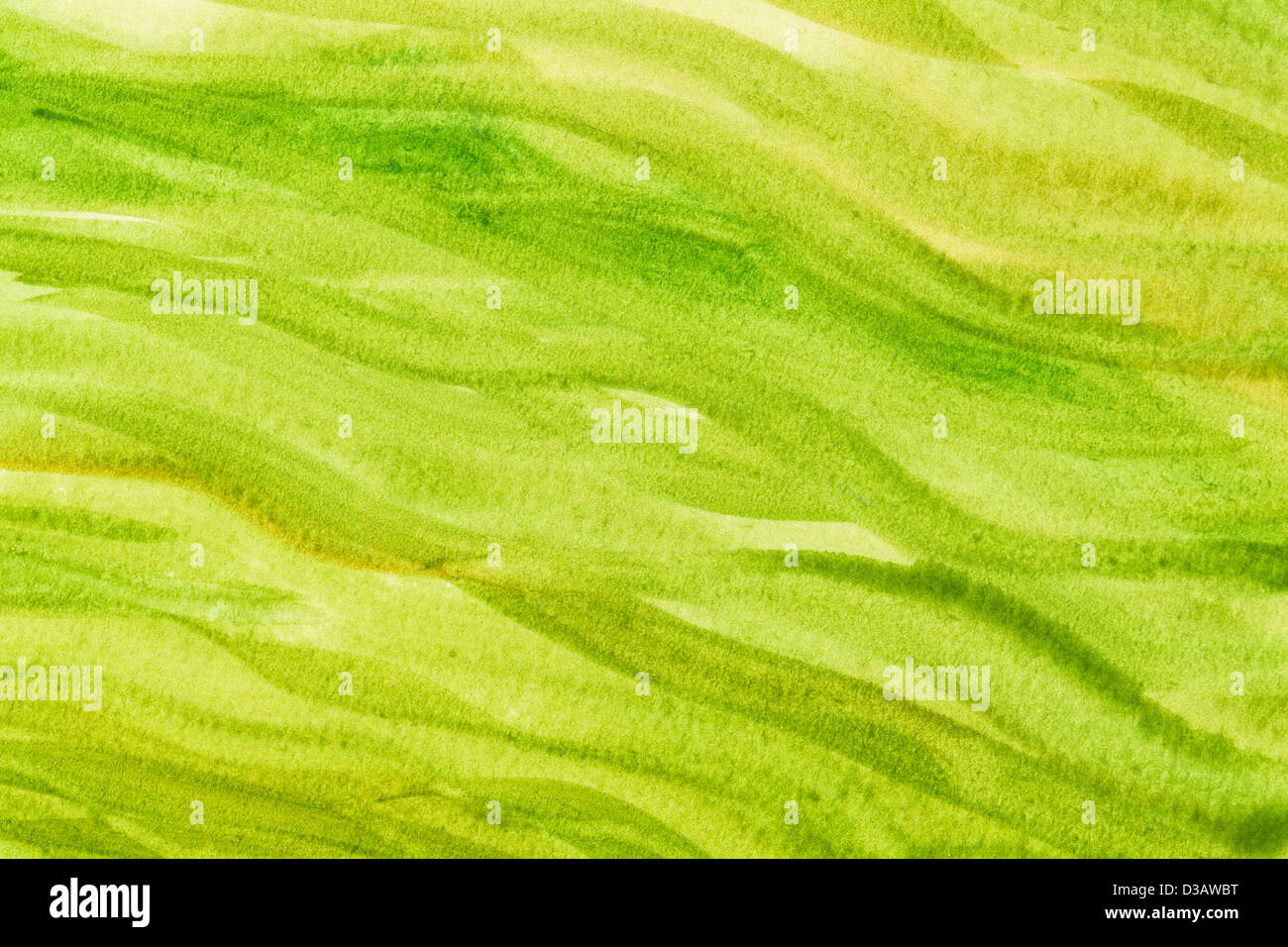 grüne und gelbe lebendige Aquarellpapier Textur mit gewellte Pinselstrichen Stockfoto
