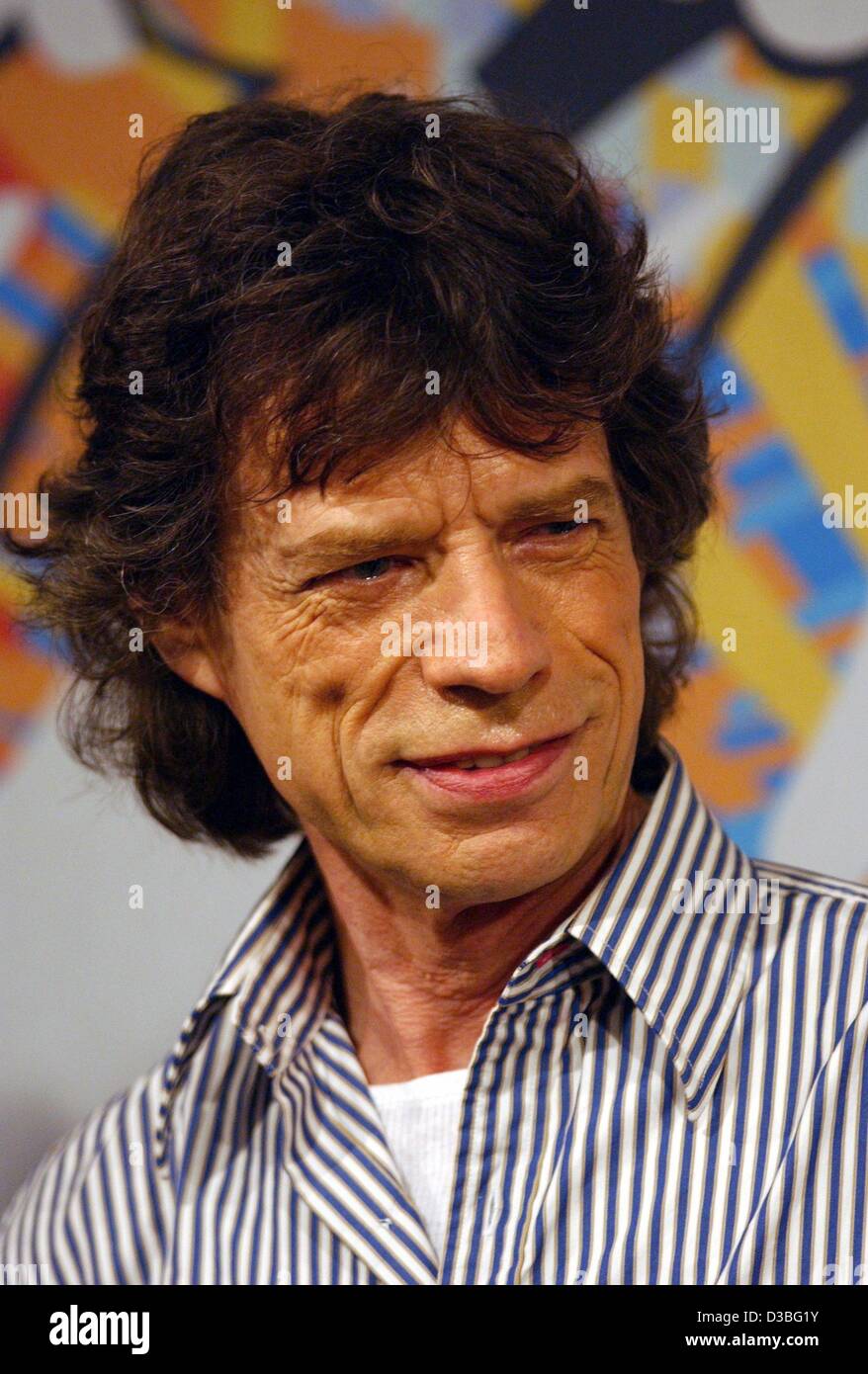(Dpa) - Mick Jagger, Frontmann der britischen Rockgruppe Rolling Stones, lächelt während einer Pressekonferenz in München, 5. Juni 2003. Stockfoto