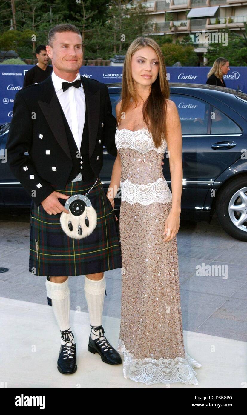 (Dpa) - schottischen Formel 1 pilot David Coulthard und seine Freundin Simone zur Preisverleihung für die Laureus Sports Award im Grimaldi Forum in Monte Carlo, 20. Mai 2003 kommen. Stockfoto