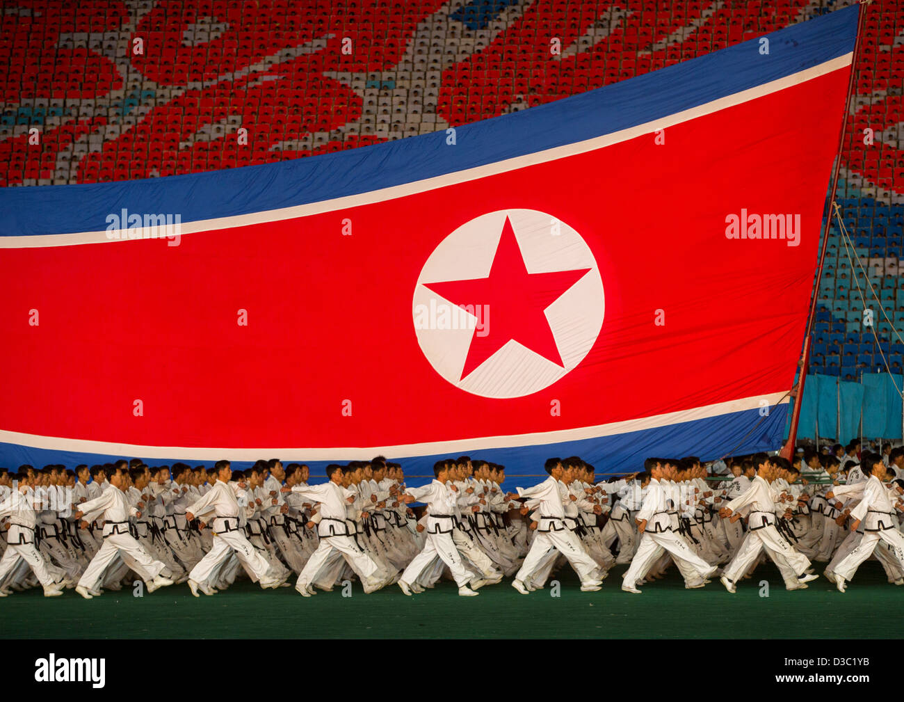 Nordkoreanischer Flagge während der Arirang Mass Games am Maifeiertag Stadium, Pyongyang, Nordkorea Stockfoto