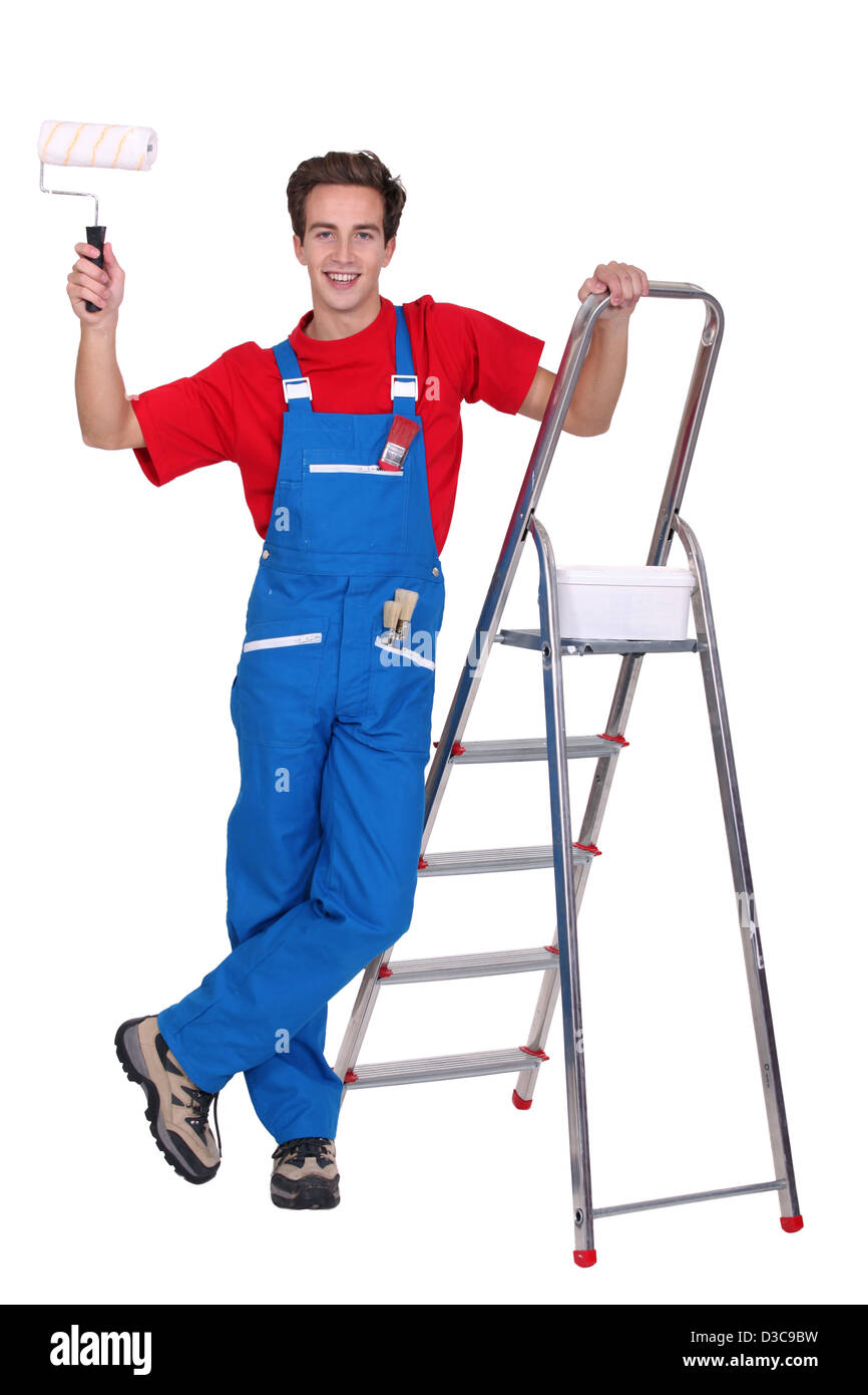Dekorateur holding Farbroller Stockfoto