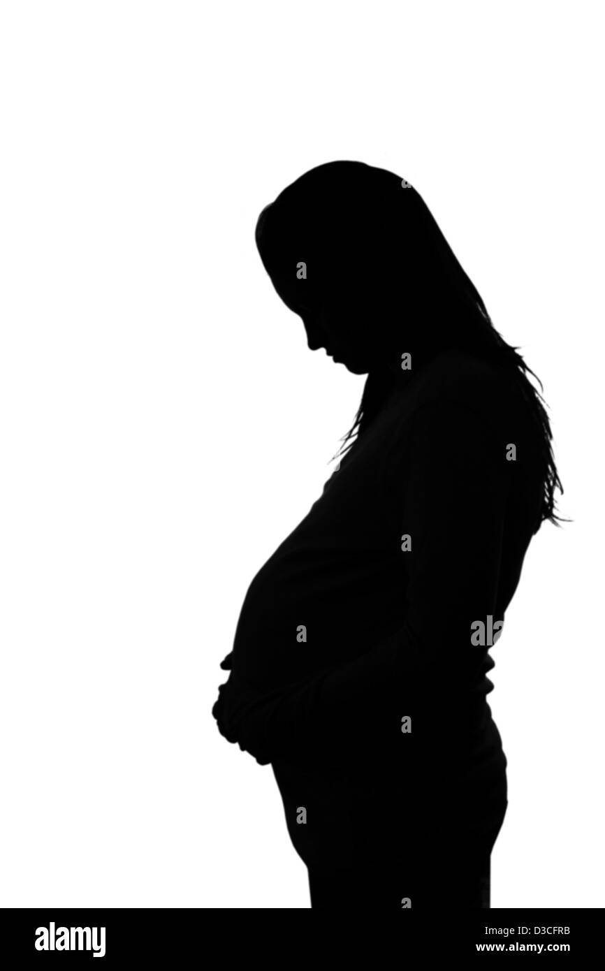 Silhouette einer schwangeren Frau Stockfoto