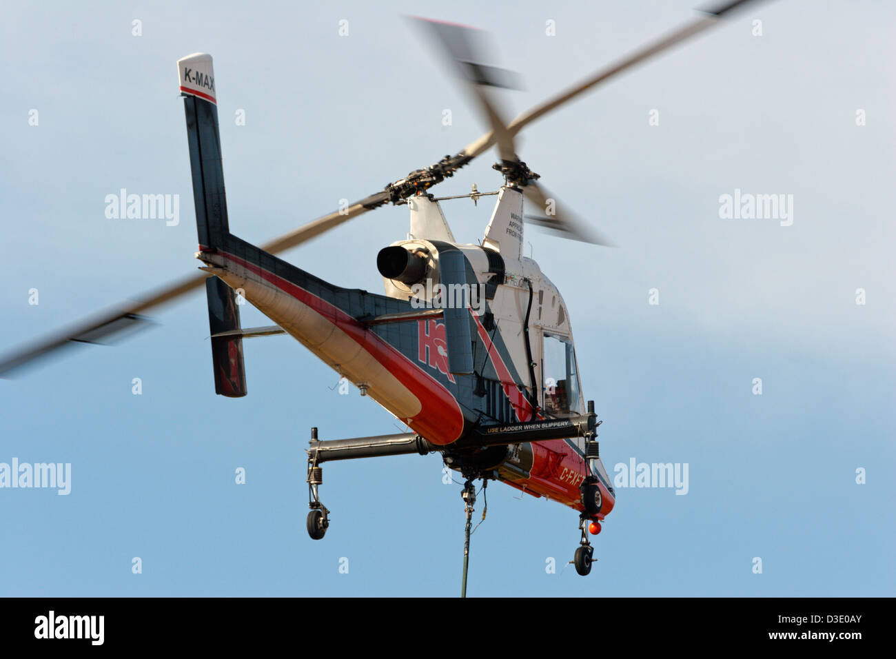 k-Max k max Hubschrauber Langleinen arbeiten HeliQuest Stockfoto