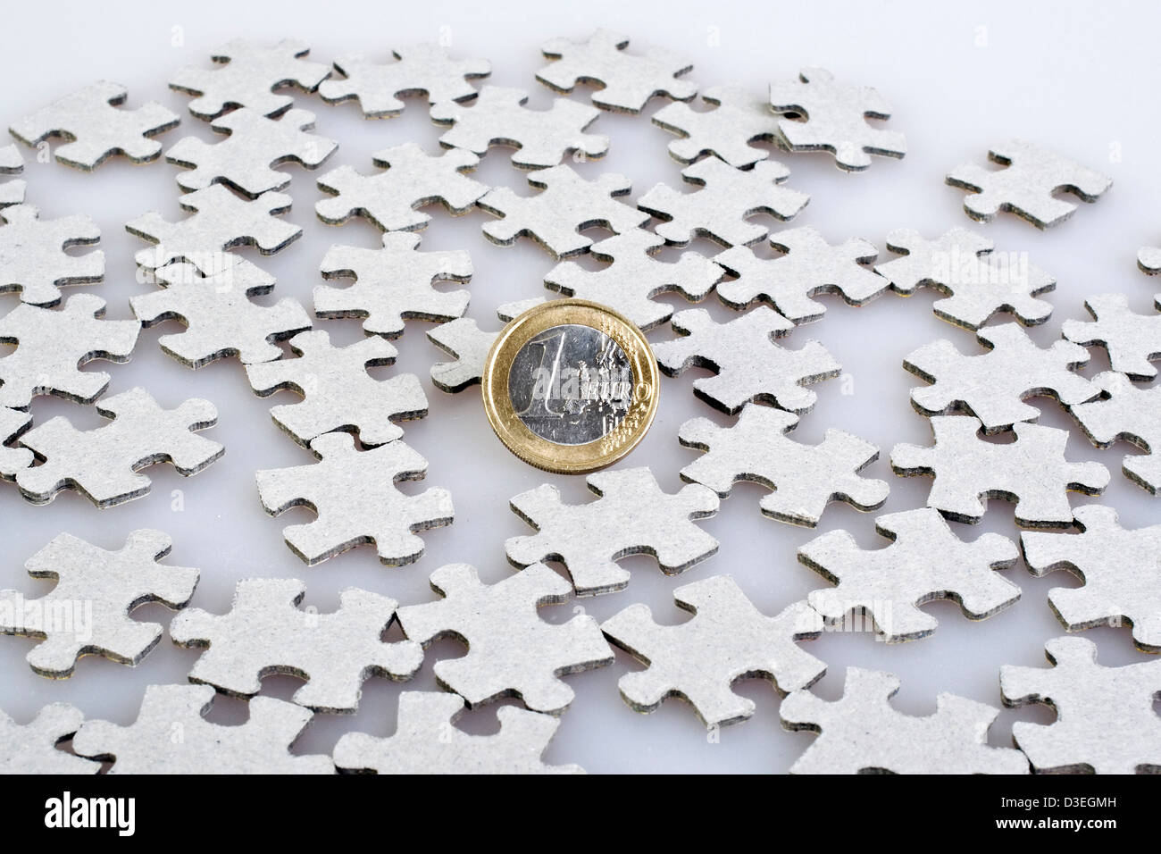 Puzzle und ein euro Stockfoto