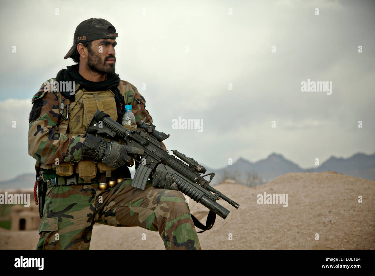 Afghan National Army Special Forces Soldaten zurück aus einer Bekämpfung Patrouille 17. Februar 2013 in der Provinz Herat, Afghanistan. Präsident Barack Obama kündigte während der Staat der Union, dass die Hälfte die US-Force in Afghanistan von Anfang 2014 zurückziehen wird. Stockfoto