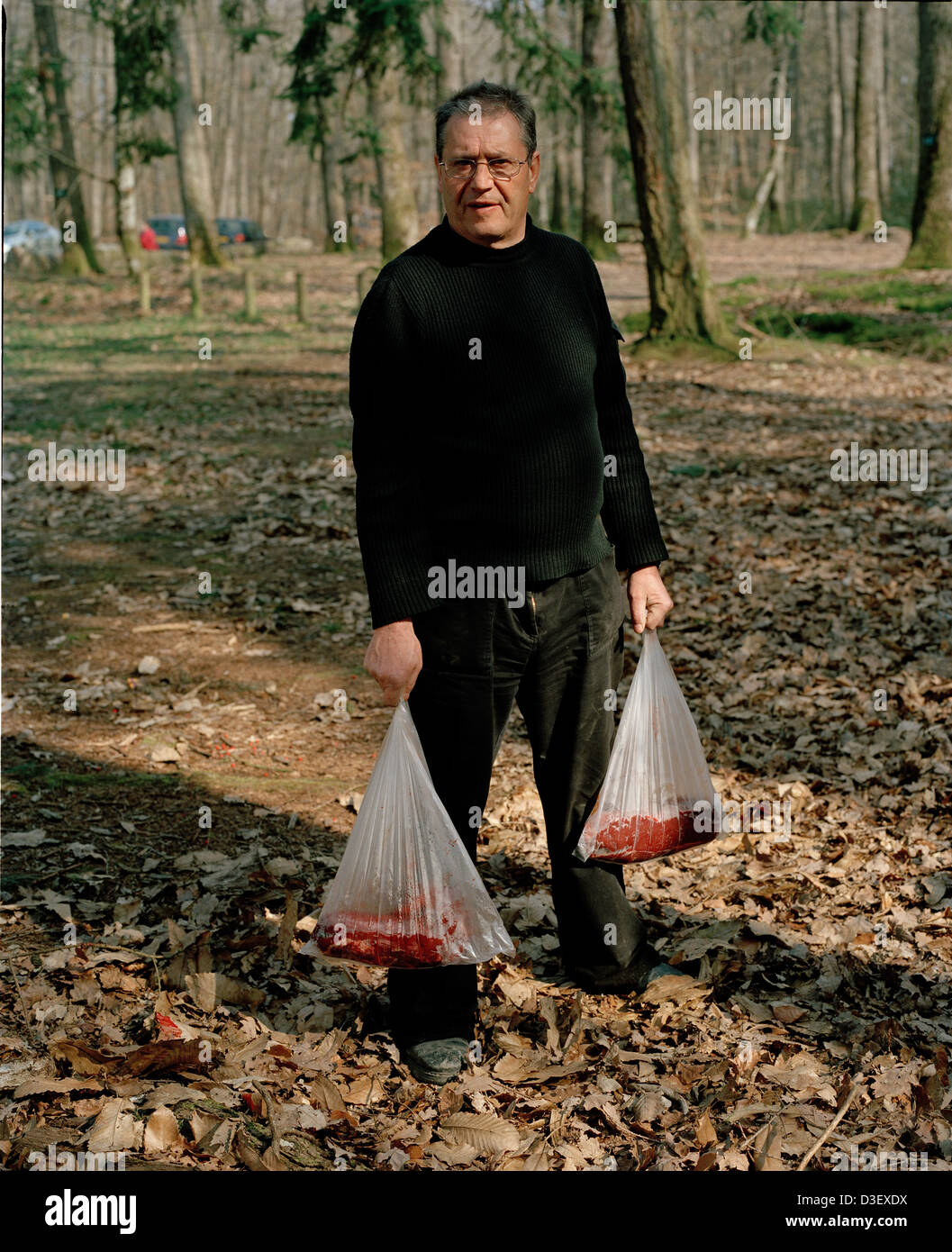 Michel Lavediaux liebt es, die Rolle der "Schlächter" für die Vautrait de Banassat. Stockfoto