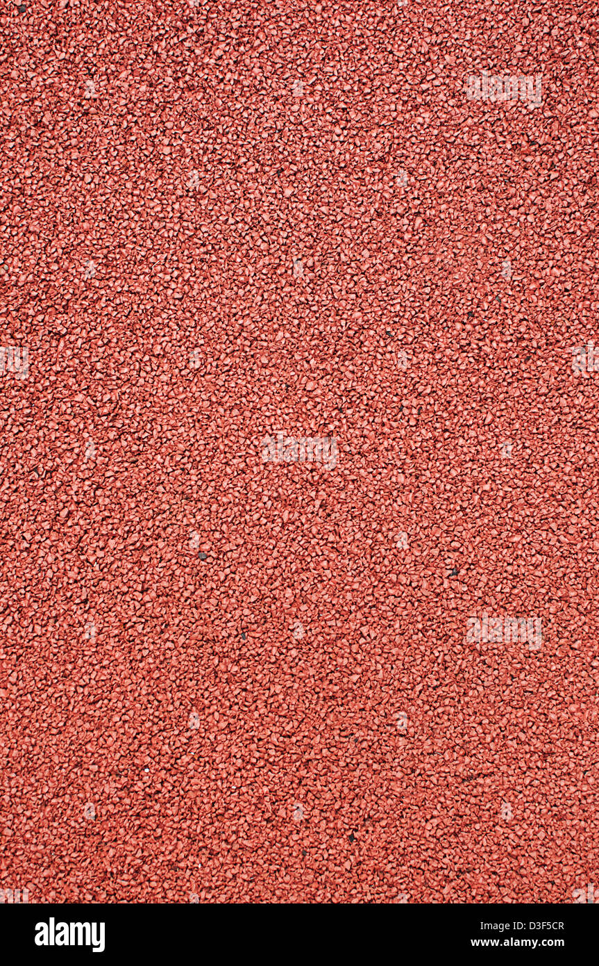 Textur der künstlichen Lauffläche für die Sportart Leichtathletik. Stockfoto