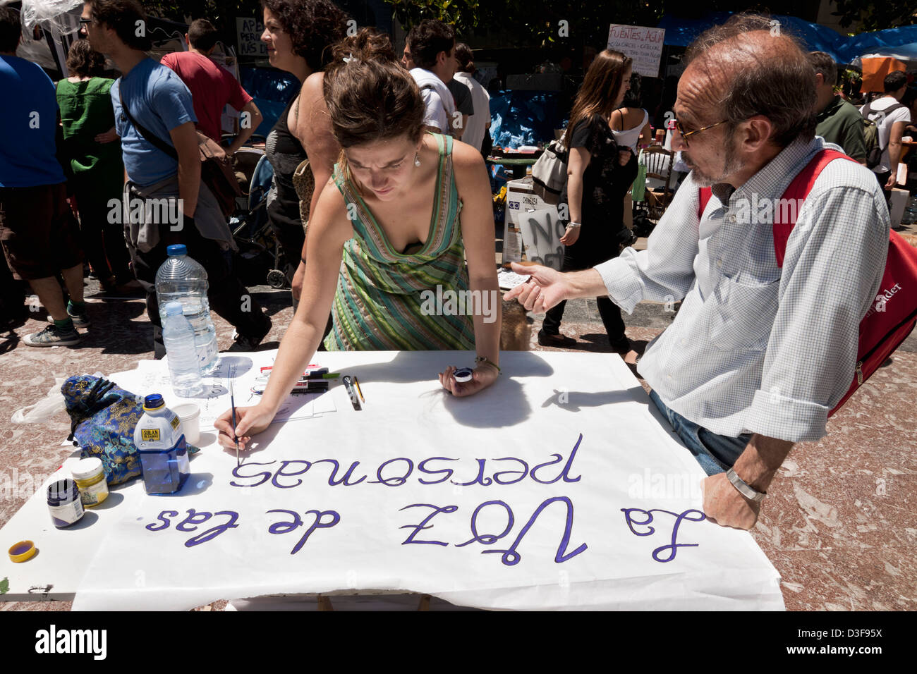 Spanische Revolution Bewegung 15-M Demonstranten schreiben Banner Stockfoto