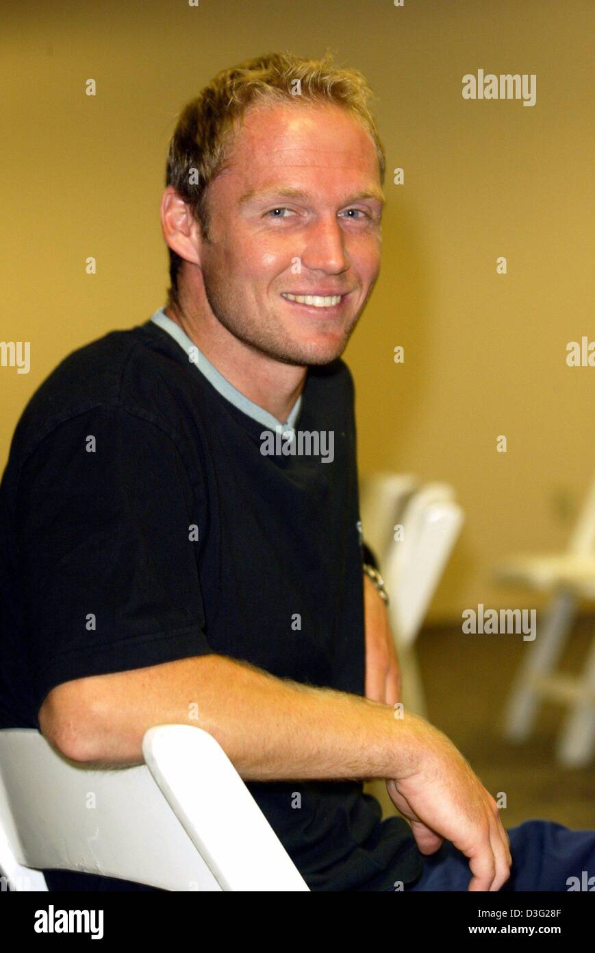 (Dpa) - deutscher Tennisspieler Rainer Schüttler lächelt nach gewann das Viertelfinale Spiel der Indian Wells Master Series in Indian Wells, Kalifornien, 14. März 2003. Stockfoto