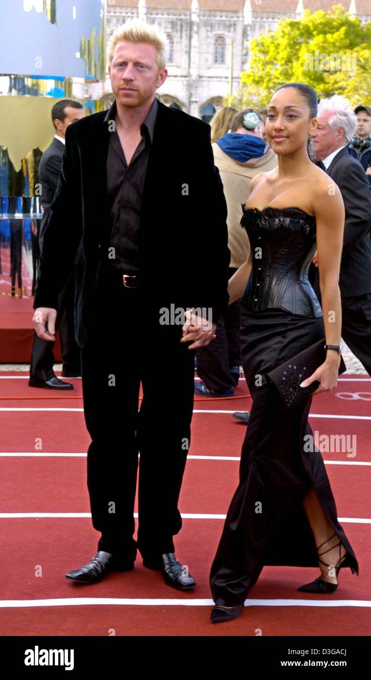 (Dpa) - deutsche ehemalige Tennis-star Boris Becker und seine Freundin französische Tänzerin Caroline Rocher kommen bei den Laureus World Sports Awards 2004 in Lissabon, Portugal, 10. Mai 2004. Stockfoto