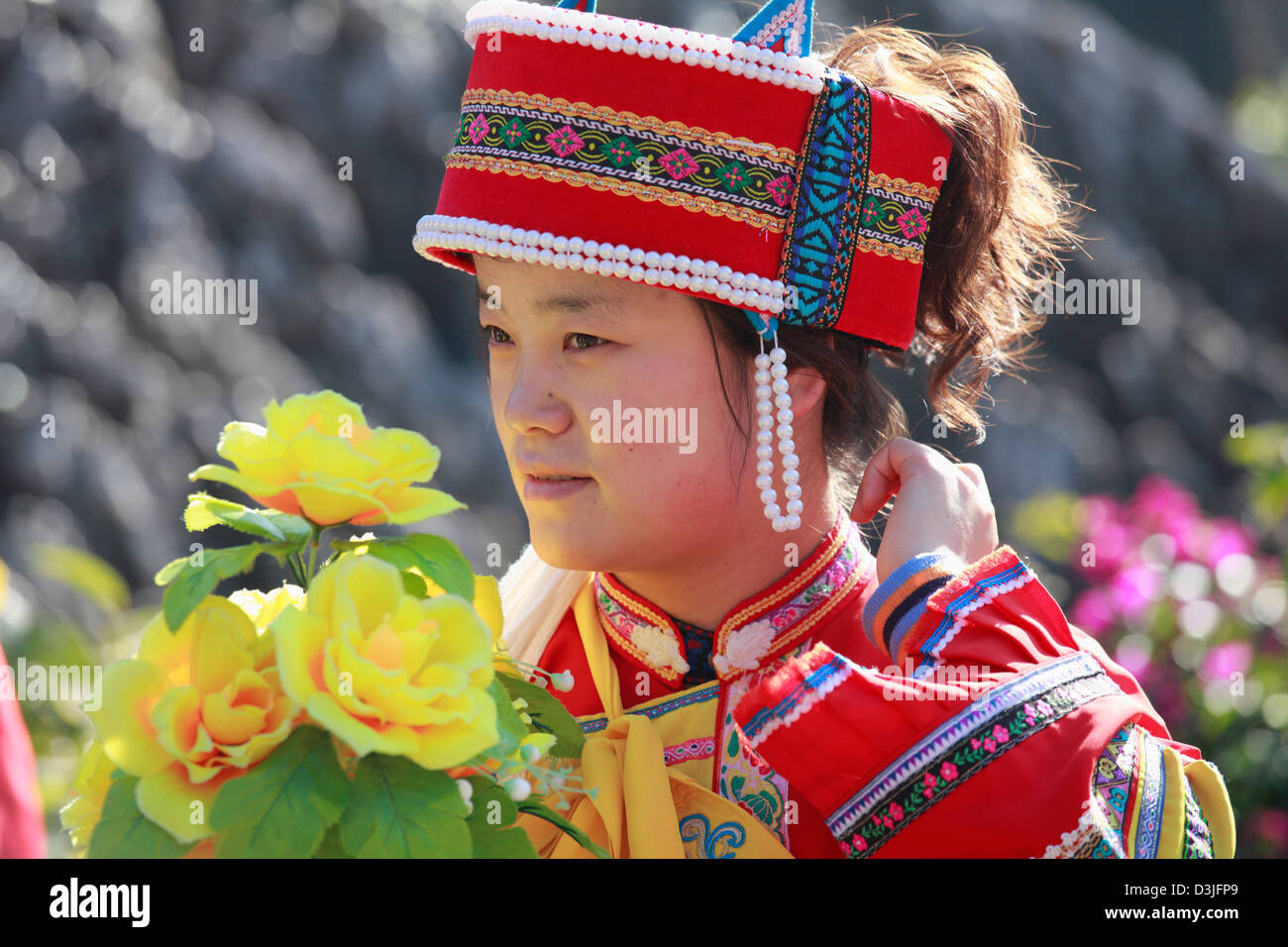 China, Yunnan, Shilin, ethnische Minderheit Frau, Stockfoto