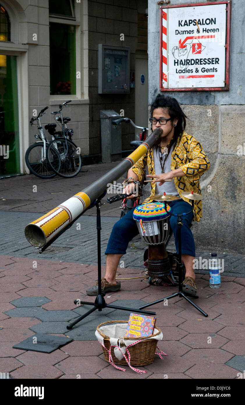 Straßenmusiker, Damrak, Amsterdam, Niederlande Stockfoto