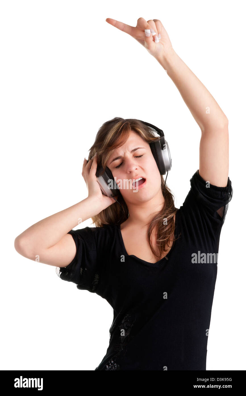 Frau tanzt mit Kopfhörern in einem weißen Hintergrund isoliert Stockfoto
