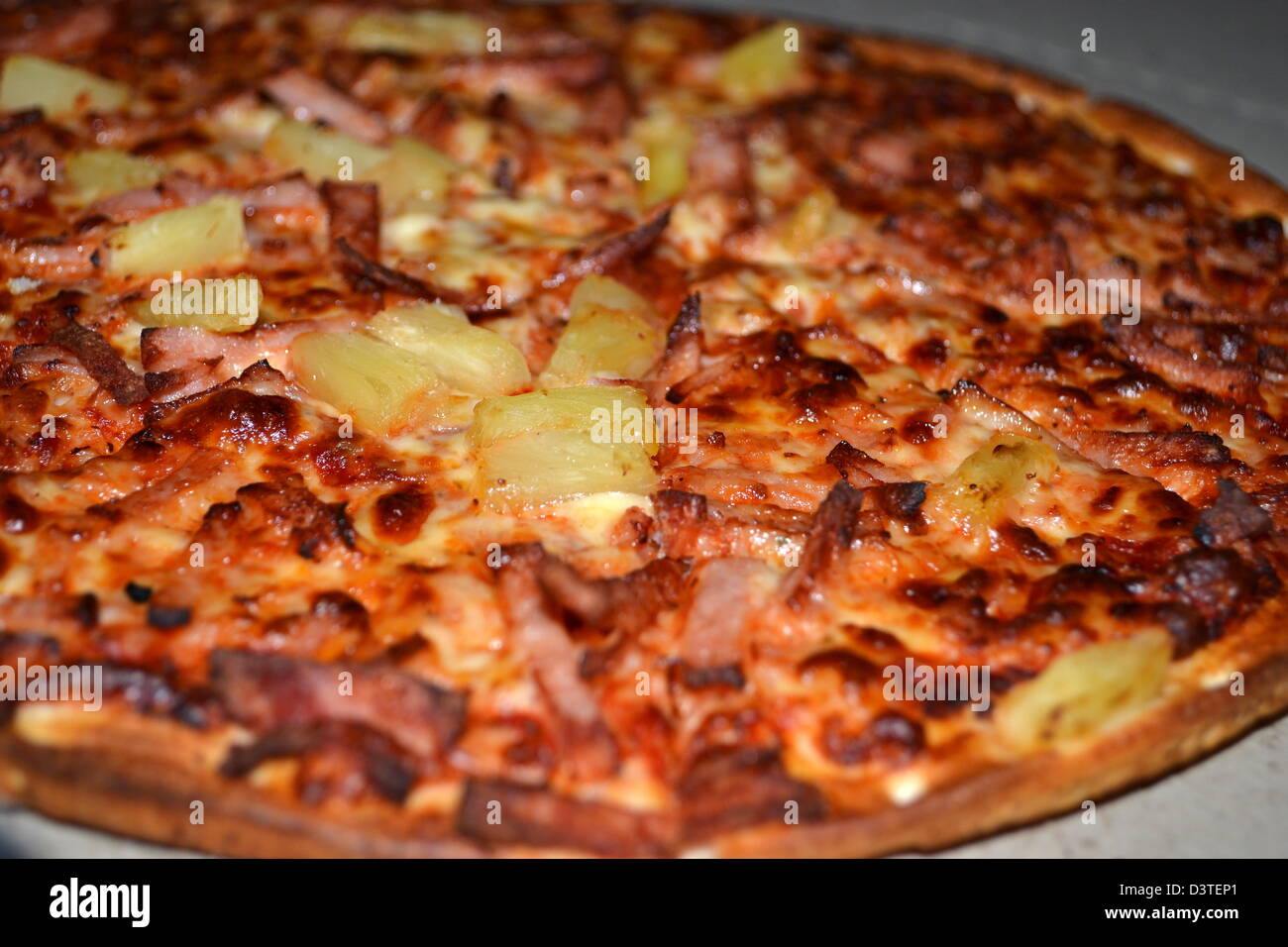 Schinken und Ananas pizza Stockfoto