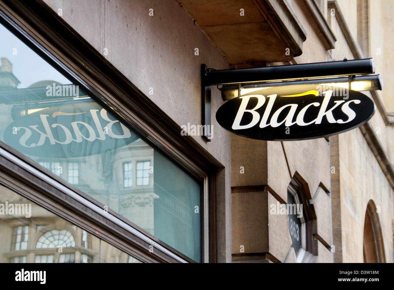 Schwarze Firmenlogo vor Oxford Shop.  Februar 2013 Stockfoto