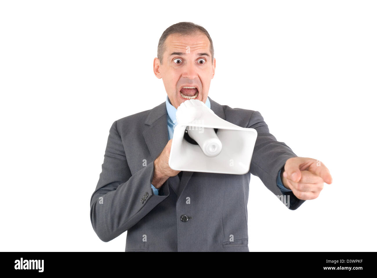 Der Chef in einem grauen Anzug in einem Megaphon ruft Stockfoto