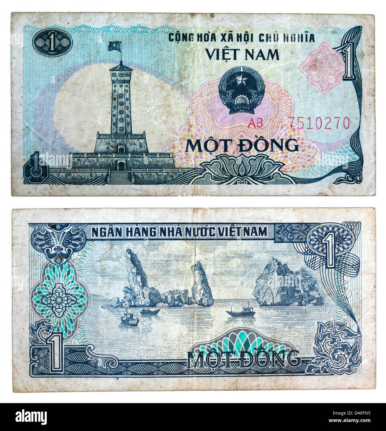 1 Dong Banknote, Turm von Hanoi und Sampans entlang der felsigen Küste, Vietnam, 1985 Stockfoto