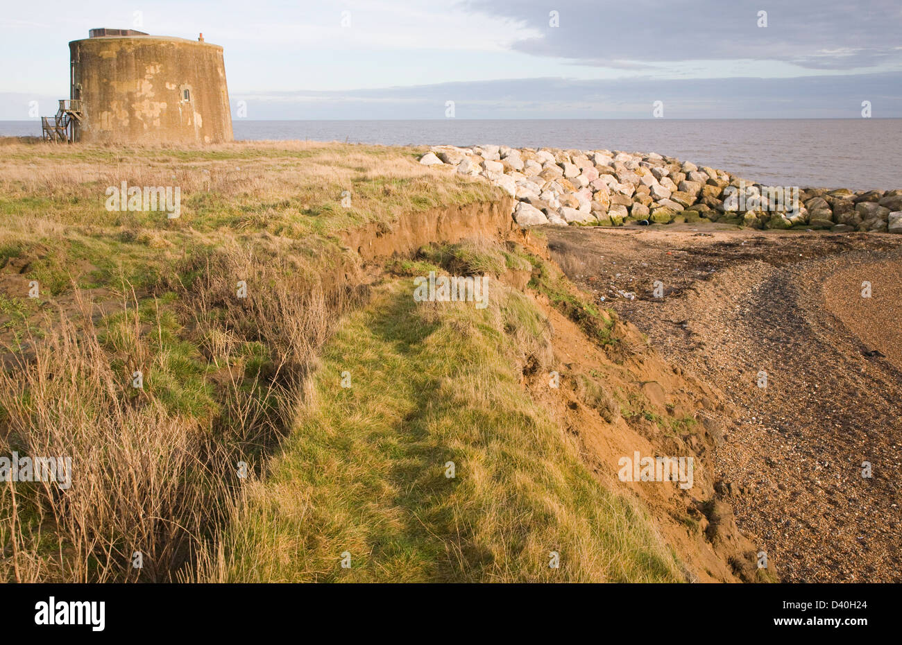 Schnell erodieren Klippe weichen roten Crag Rock im Osten Lane, Bawdsey, Suffolk, England Stockfoto