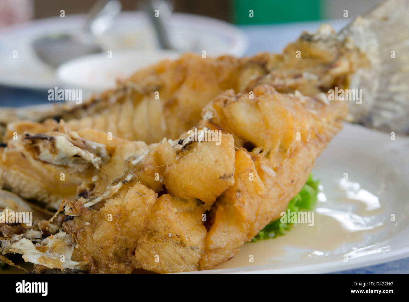 Fischgericht - gebratenes Fischfilet mit Gemüse Stockfoto