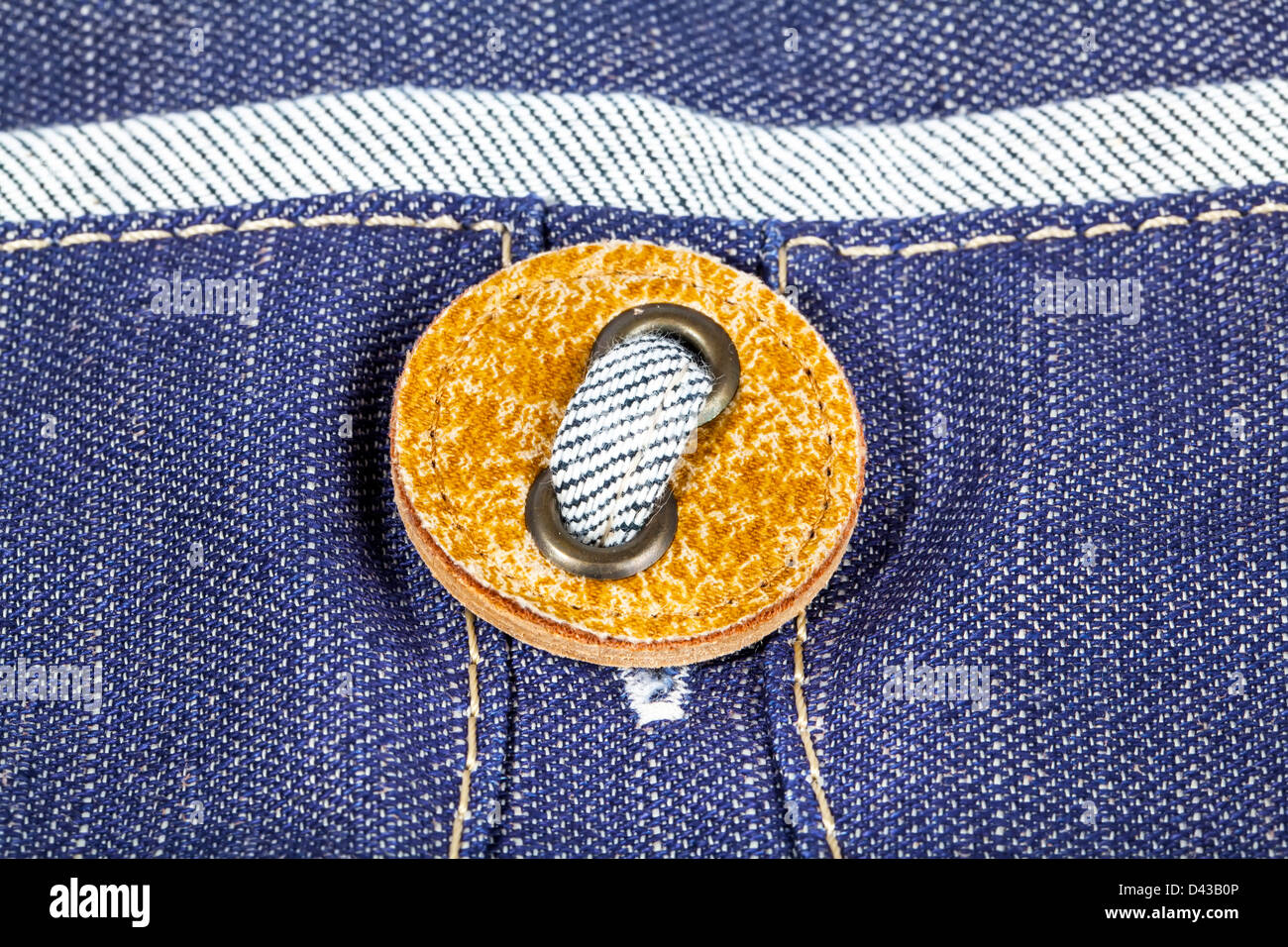Taste auf Jeans Textil closeup Stockfoto