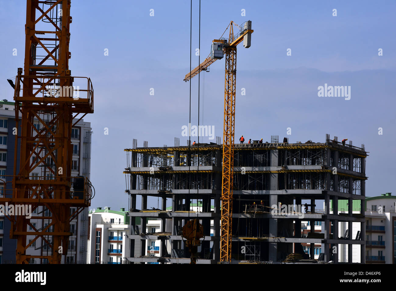 Menschen, die im Freien im Hochbau arbeiten Stockfoto