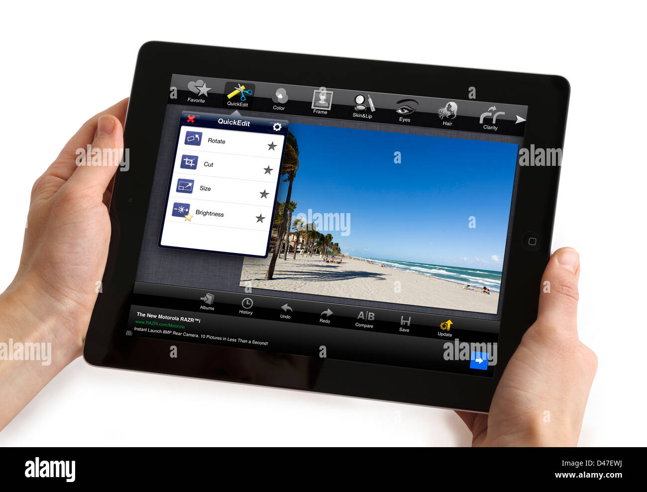 Bearbeiten ein Foto mit der kostenlosen app von Fotolr HD auf eine 4. Generation Apple iPad, USA Stockfoto