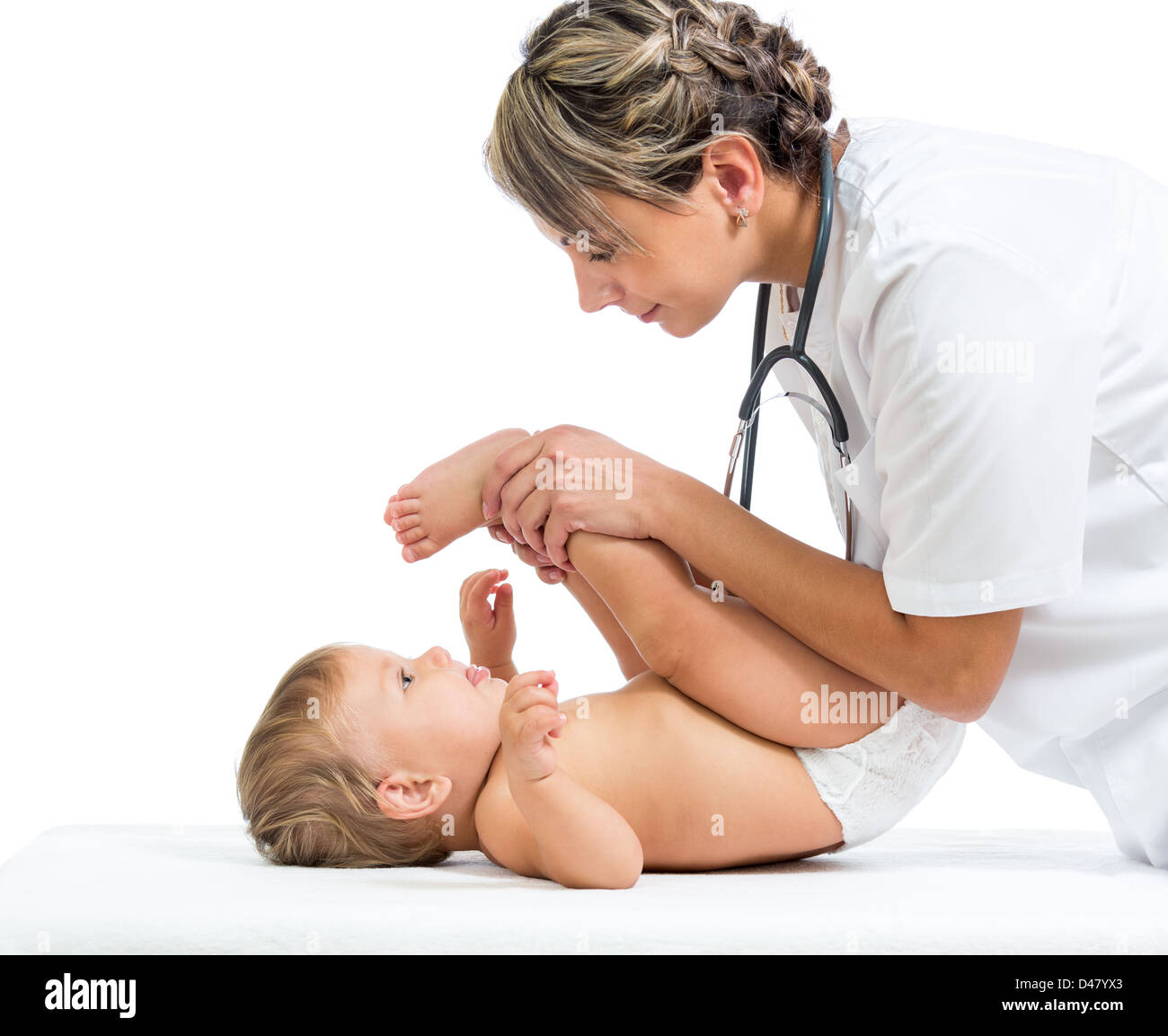Arzt massieren oder machen Gymnastik Babymädchen Stockfoto