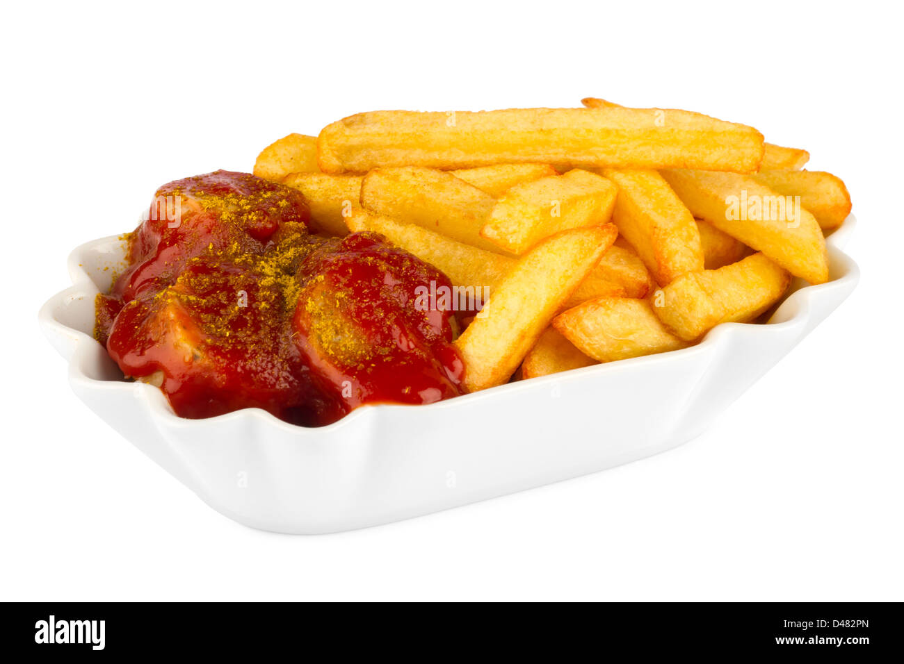 Keramikschale mit Currywurst und Pommes frites Stockfoto