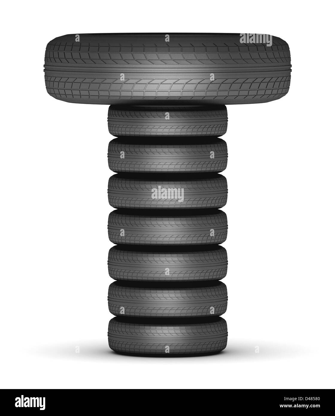 Buchstabe T aus gestapelten Reifen Stockfoto