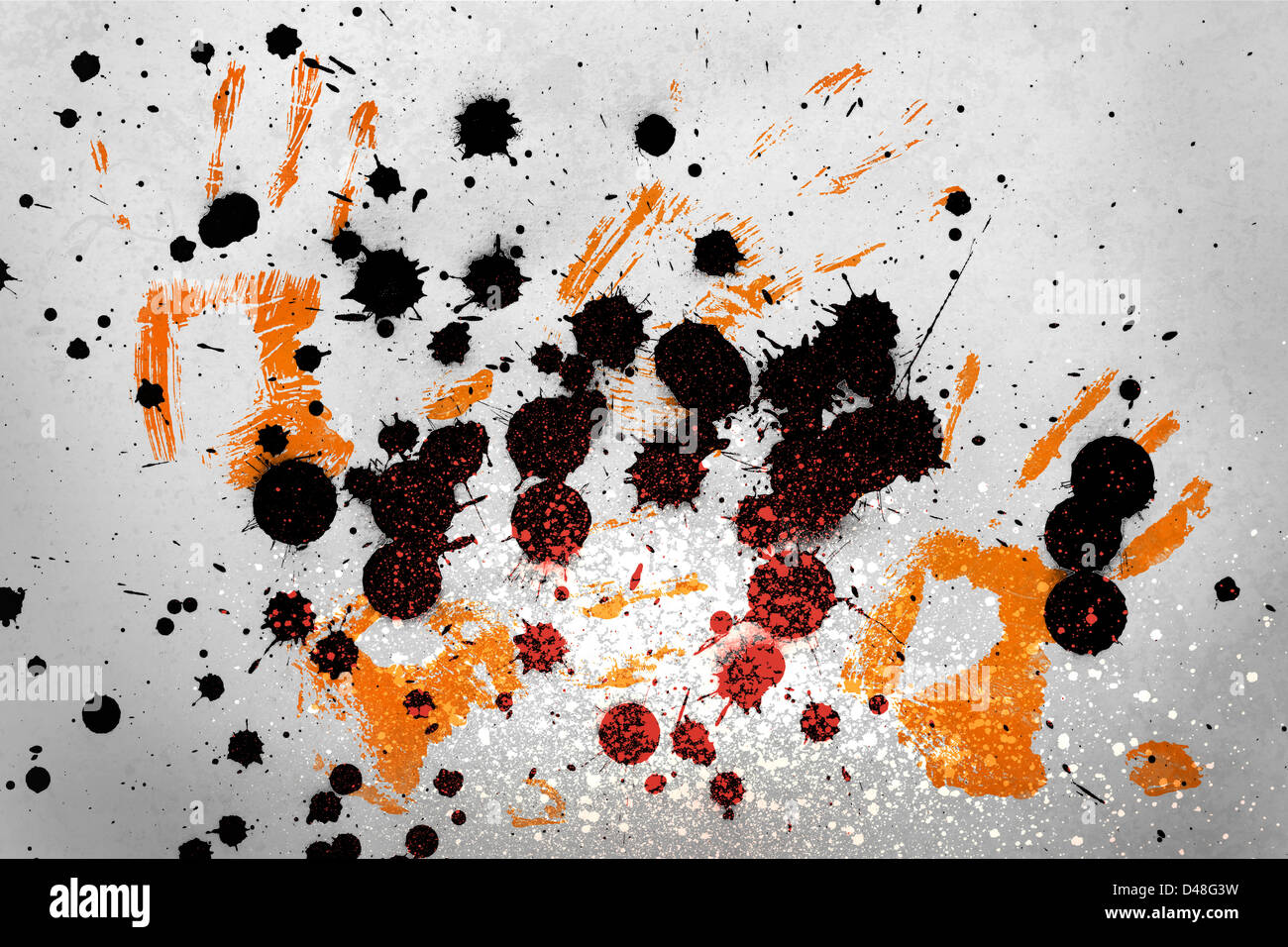 Orange Handabdrücke mit Tintenflecken Stockfoto