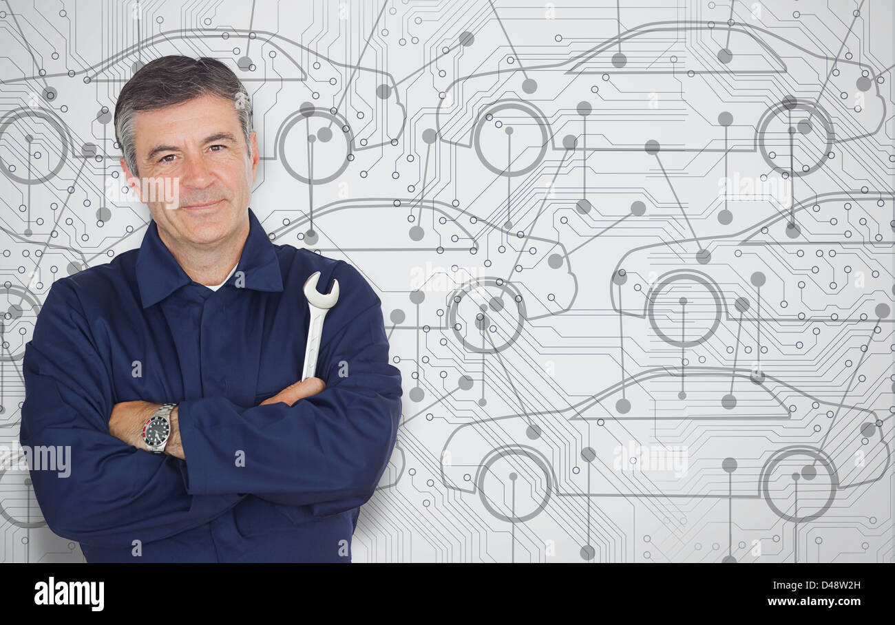 Ausgereifte Mechanik stand vor einen Diagrammhintergrund Autos Stockfoto